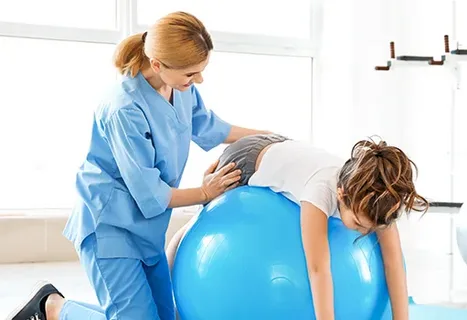 Paediatric Physical Therapy and Management of Degenerative Neurological Diseases 2 child physiotherapist Dubai